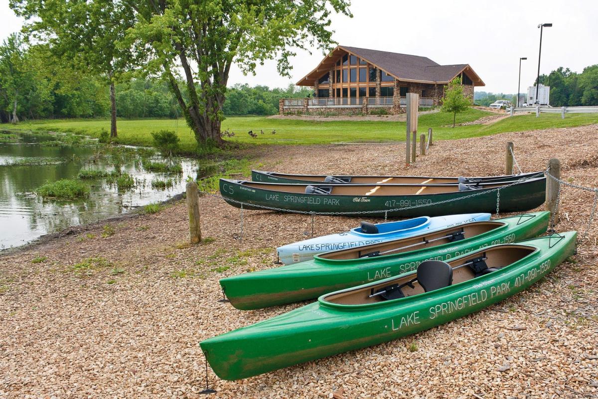 Kayak through the serene waters of Lake Springfield Boathouse.