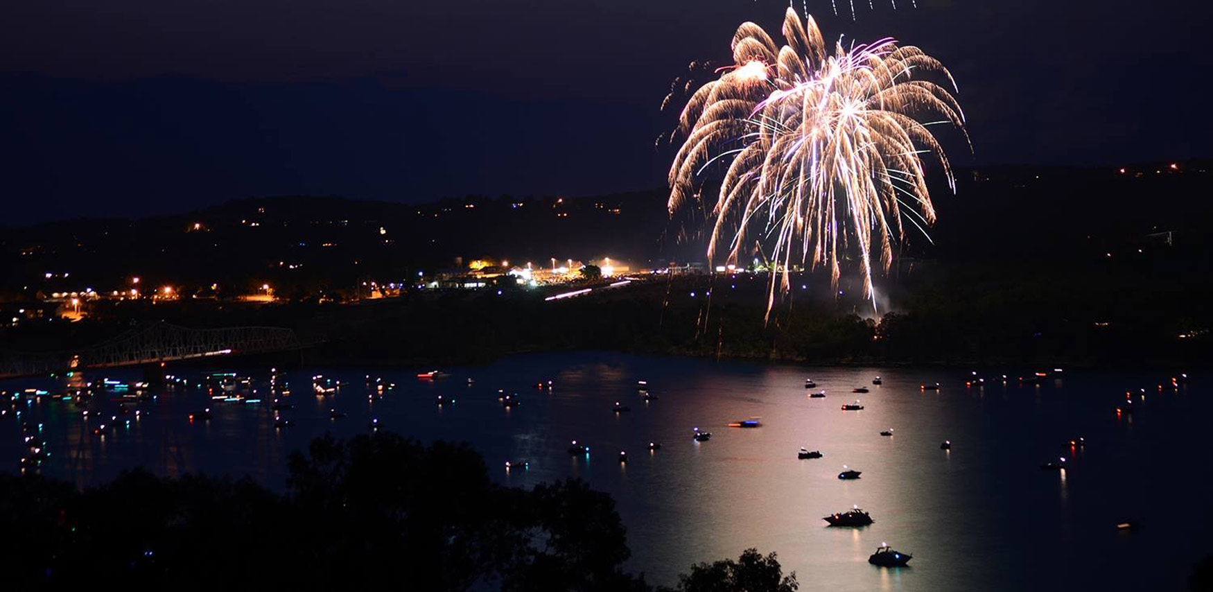 An awe-inspiring display of fireworks illuminates the night sky above Table Rock Lake, marking a beloved Independence Day tradition.